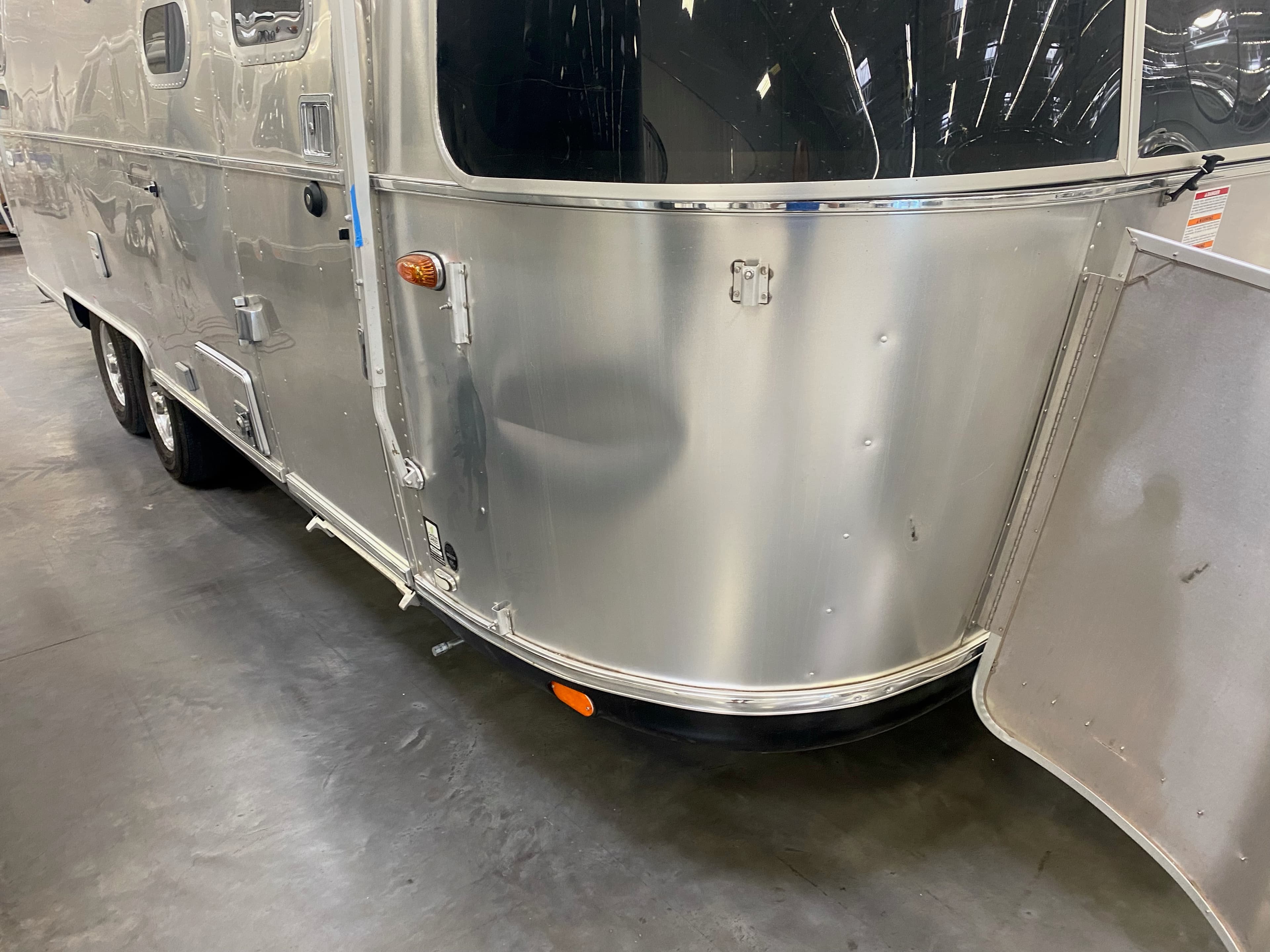Airstream aluminum body prepared for collision repair and segment replacement